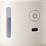 Close-up of Misty Grinch base controls, water-level window, and connection port