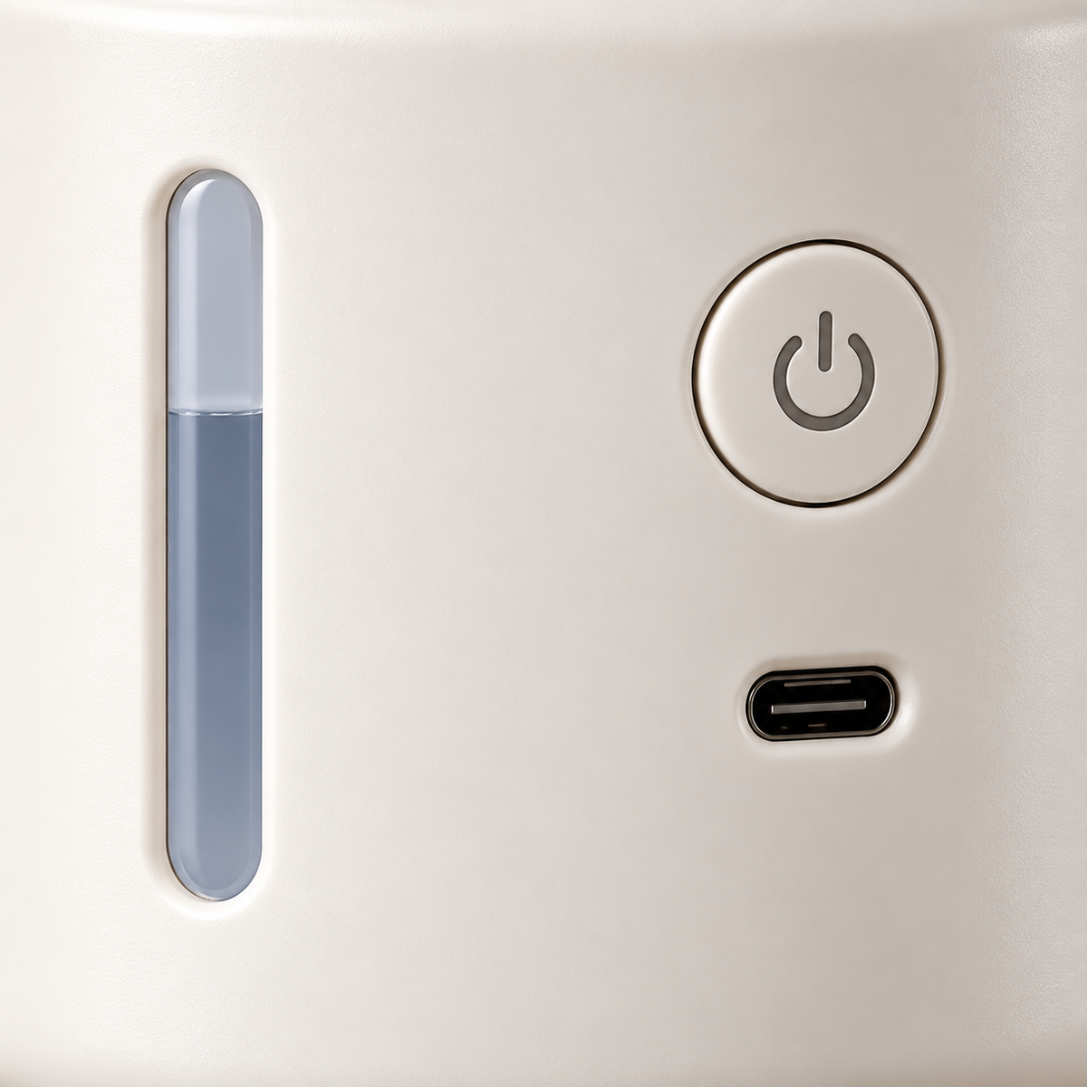 Close-up of Misty Grinch base controls, water-level window, and connection port